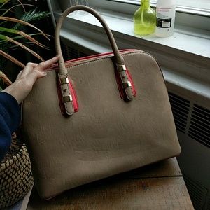 Charming Charlie large coral and tan bag